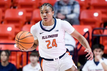 Adalia McKenzie of the Illinois Fighting Illini dribbles during the women's college basketball game between the Oregon State Beavers.