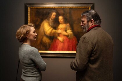 Stella and Gerry look at each other in Midwinter Break (2026).