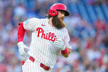 Brandon Marsh of the Philadelphia Phillies runs to first against the Chicago Cubs.