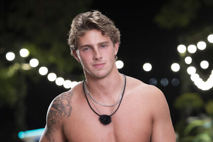 Caleb McDaniel shirtless in white short in Love Island USA Season 8.