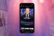 A smartphone showing Peacock's homepage with AI Andy Cohen.