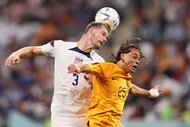 Walker Zimmerman of the United States heads a ball during a FIFA World Cup Qatar 2022.