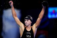 Katie Ledecky of Team United States cheering after winning the gold medal during the Women's 1500m Freestyle Final on day 19 of the Singapore 2025 World Aquatics Championships.