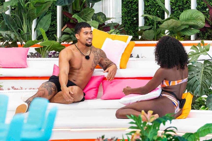 Sean David Reifel talking to someone on Love Island USA Season 8.